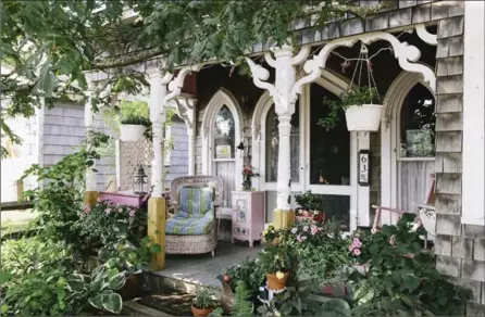  ?? ELIZABETH CECIL, NYT ?? The cottage of Jessica B. Harris, who hosts a “five to seven” soiree on her porch, in the Oak Bluffs section of Martha’s Vineyard.