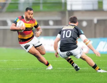  ?? Photo / Getty Images ?? D'Angelo Leuila of Waikato runs the ball against Taranaki.