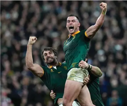  ?? ?? South Africa's Jesse Kriel, right, and South Africa's Eben Etzebeth celebrate after the Rugby World Cup final match between New Zealand and South Africa at the Stade de France in Saint-Denis, near Paris Saturday, Oct. 28, 2023. South Africa won the match 12-11. (AP Photo/Thibault Camus)