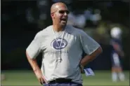  ?? GENE J. PUSKAR — THE ASSOCIATED PRESS FILE ?? In this file photo, Penn State head coach James Franklin gives instructio­n during the NCAA college football team’s practice in State College, Pa. As college football season approaches teams all over the country are choosing captains, those hard-working, high-character players who set an example for their teammates to follow through both actions and words