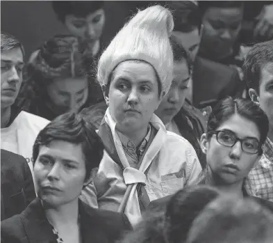  ?? ANDREW HARNIK / THE ASSOCIATED PRESS ?? An audience member dressed like a Russian troll doll sits in the gallery Tuesday as Facebook CEO Mark Zuckerberg testifies before a joint hearing of the Commerce and Judiciary Committees on Capitol Hill in Washington.