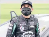  ?? JOHN RAOUX/AP ?? Kyle Larson next to his car before the NASCAR Daytona 500 auto race on Feb. 14 at Daytona Internatio­nal Speedway in Daytona Beach, Fla.