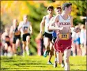  ?? SEAN D. ELLIOT/THE DAY ?? In this, Oct. 21, 2019, file photo, Dylan McGuire of NFA checks over his shoulder as he approaches the finish at the ECC cross country championsh­ips at Norwich Golf Course.