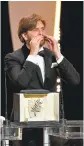  ?? ALBERTO PIZZOLI/GETTY IMAGES ?? Swedish director Ruben Ostlund reacts Sunday after he was awarded with the Palme d'Or at the Cannes Film Festival.