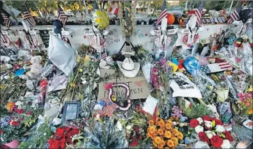  ?? Al Seib Los Angeles Times ?? A MEMORIAL in Thousand Oaks for the 12 people killed in a shooting at Borderline Bar and Grill in 2018. Recent mass shootings drive home the point that we need to pass common-sense gun laws, Steve Lopez says.