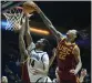  ?? GODOFREDO A. VASQUEZ — AP ?? USC guard Tre White, right, blocks a shot by Cal forward Grant Newell in the first half Wednesday.