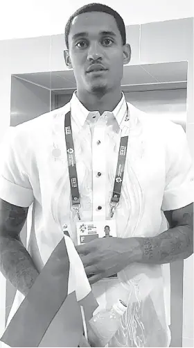  ?? / PSC TWITTER ACCOUNT ?? ■ KAHADLUKAN: Si Cleveland Cavaliers guard Jordan Clarkson, kinsa sakop sa Gilas Pilipinas, nagsul-ob og barong tagalog kagahapon atol sa opening ceremony sa 2018 Asian Games sa Indonesia. Ang paghiabot ni Clarkson gituohang nakahatag og kabalaka sa mga kontra sa Gilas Pilipinas sa basketball event sa matag upat ka mga tuig nga kompetisyo­n.