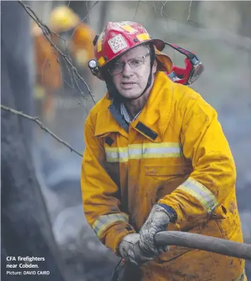  ?? Picture: DAVID CAIRD ?? CFA firefighte­rs near Cobden.