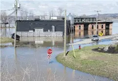  ?? ANDREW VAUGHAN / THE CANADIAN PRESS ?? The Picaroons craft brewery is surrounded by the waters of the St. John River in Fredericto­n, N.B., on Sunday.