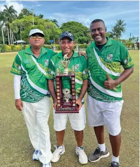  ?? Photos: Waisea Nasokia ?? From left: Munesh Kumar, Dan Vinod, and Bobby Prasad with the Bowls Fiji national Open trips trophy.