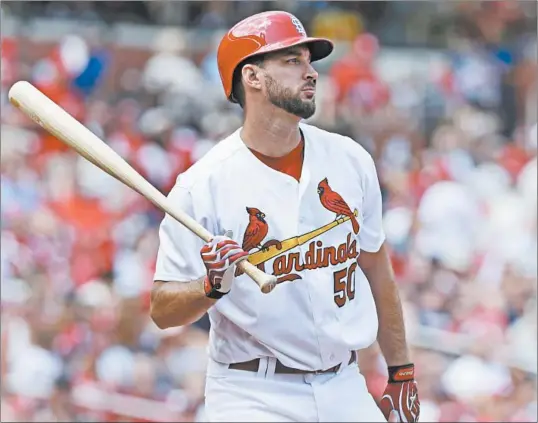  ?? TOM GANNAM/AP ?? Cardinals' Adam Wainwright bats in a game in St. Louis. Under new rules for this abbreviate­d baseball season delayed by the coronaviru­s, all games will have a designated hitter.