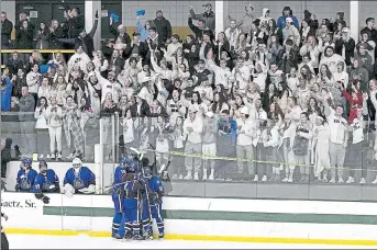  ?? SENTINEL & ENTERPRISE FILE ?? Lunenburg/Ayer Shirley celebrates in front of its fan section during the 2020 Div. 3A final. The MIAA Ice Hockey Committee has finalized the capacity minimums for tournament games in 2021-22.