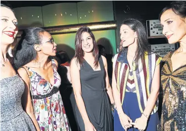  ??  ?? Emily Blumenthal, right, with, from left, Jennifer Hamley, Ilham Mohamed, Shivani Suhag and Yliana Yepez at the Independen­t Handbag Designer Awards.