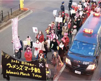  ?? Picture: AP ?? MAKING A DIFFERENCE: Participan­ts march to mark Internatio­nal Women’s Day in Tokyo, Japan yesterday.