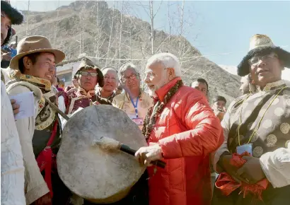  ?? PTI ?? Prime minister Narendra modi beats a drum at muktinath temple in muktinath on saturday. —