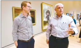  ?? NWA Democrat-Gazette/FLIP PUTTHOFF ?? U.S. Rep. Derek Kilmer (left), D-Wash., and Rep. Steve Womack, R-Rogers, tour Crystal Bridges Museum of American Art on Wednesday in Bentonvill­e. Womack is hosting Kilmer and his wife, Jennifer, for their visit to the region after Womack toured Kilmer’s district in September. The cross-party visits are designed to foster better relationsh­ips between the two parties, said John Richter with the Bipartisan Policy Center in Washington, D.C.