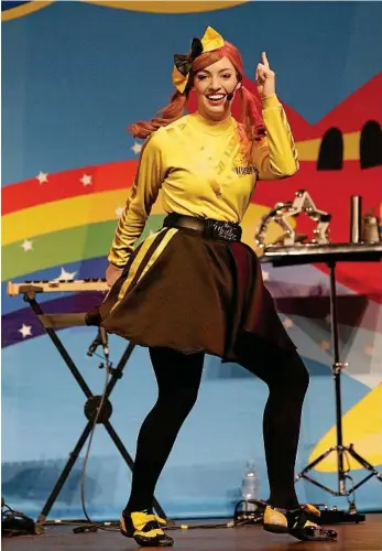  ?? PHOTO: AP /ROB GRIFFITH ?? SHE’S THE GIRL WITH THE BOW IN HER HAIR: Emma Watkins, the Yellow Wiggle, wants to keep wiggling at least until she turns 60.