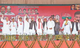  ?? ?? Seeking votes: Samajwadi Party president Akhilesh Yadav with party leaders at an election rally in Mirpur, Muzaffarna­gar, on Saturday.