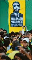  ?? Foto: Nelson Almeida, afp ?? Unterstütz­er des Präsidents­chaftskand­idaten Bolsonaro.