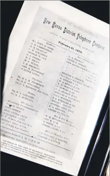  ?? Arnold Gold / Hearst Connecticu­t Media file photo ?? A facsimile of the first telephone directory in the world, in the boardroom of C. Cowles Co. in New Haven in June 2015.