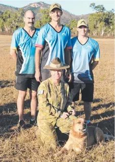  ?? COME JOIN IN: Lance Corporal Jeremy Jones, WO1 Marcel Zevenberge­n, Private Laurence Reilly, Private Megan Hunt and 3 CSSB mascot Lance Corporal Tobias. ??