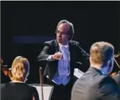  ??  ?? Guest conductor Fabio Mastrangel­o and the HPO brought Italian opera to FirstOntar­io Concert Hall in October.