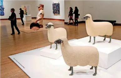  ?? [PHOTOS BY NATE BILLINGS, THE OKLAHOMAN] ?? Moutons de Pierre, by Francois-Xavier Lalanne, is featured in the exhibit “Off the Wall: One Hundred Years of Sculpture” at the Oklahoma City Museum of Art in Oklahoma City on Thursday.