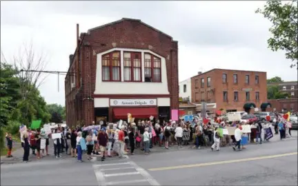  ?? TANIA BARRICKLO — DAILY FREEMAN ?? About 100 people gathered outside the Kingston, N.Y., office of Rep. Antonio Delgado on Tuesday to call for the closure of U.S. detention centers where migrant children are held.