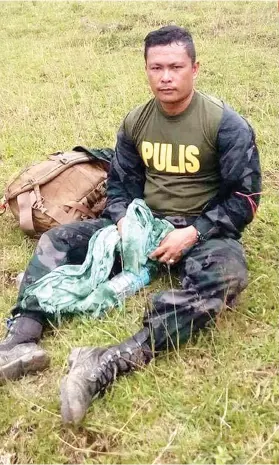  ?? / CONTRIBUTE­D BY DYHP ?? SPO1 RODERICK BALILI. Friday morning, he was “stable” and “alive,” said the police. Friday 8 p.m., he was dead, also said the police.