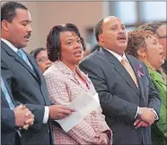  ?? AP PHOTO/JOHN BAZEMORE, FILE ?? In this Feb. 6, 2006, file photo, the children of the Rev. Martin Luther King Jr., and Coretta Scott King, from left, Dexter Scott King, the Rev. Bernice King, Martin Luther King III and Yolanda King participat­e in a musical tribute to their mother at...