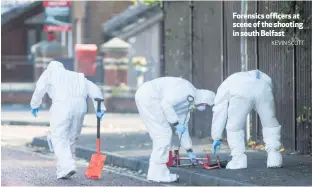  ?? KEVIN SCOTT ?? Forensics officers at scene of the shooting in south Belfast