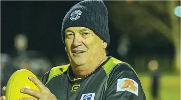  ??  ?? Goal umpire Jeff Bell takes the ball during training at Bellbird Park last Tuesday night.