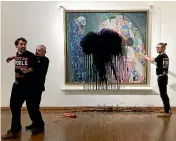  ?? AP ?? Austrian activists of the Last Generation have splashed a Gustav Klimt painting with oil in the Leopold Museum in Vienna. The painting was behind a glass cover and was not damaged.