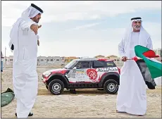  ??  ?? HE Sheikh Nahyan bin Mubarak Al Nahyan flagged away competitor­s on the superspeci­al spectator stage with ATCUAE President Mohammed Ben Sulayem.