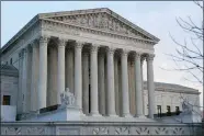  ?? PATRICK SEMANSKY - THE ASSOCIATED PRESS, FILE ?? The Supreme Court is taking up a first case about a federal law shielding Google, Twitter, Facebook and other companies from lawsuits over content posted on their sites by others.
