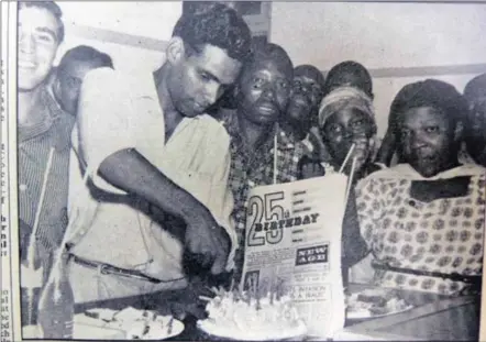  ??  ?? CELEBRATIO­N: Ebrahim Ebrahim cuts the cake with ANC comrades on the 25th anniversar­y of the publicatio­n of New Age in Durban in 1962, with Ronnie Kasrils to his right.