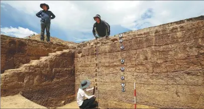  ?? PHOTOS PROVIDED TO CHINA DAILY ?? Archaeolog­ists conduct excavation work at the Piluo site.
