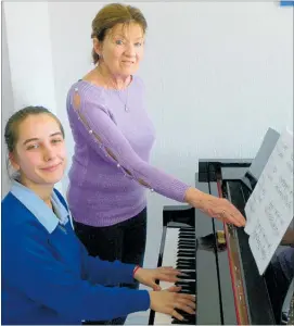  ?? Photo / Rachel Canning ?? Eden Clapperton passed her Associate of Trinity College London diploma exam with Distinctio­n. She is pictured with her piano teacher Vivienne Sands.