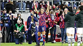  ?? ANDY CLAYTON-KING / AP ?? United States’ forward Carli Lloyd is honored before a soccer friendly match against South Korea on Tuesday in St. Paul, Minn.