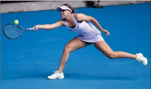  ?? The Associated Press ?? American Sofia Kenin returns to Kaia Kanepi during their second-round match at the Australian Open in Melbourne, Thursday.