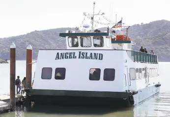  ?? Paul Chinn / The Chronicle 2018 ?? Passengers board a ferry boat to Angel Island from Tiburon. Service from San Francisco could get a new operator. Talks are under way to preserve the route.