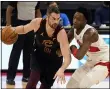  ?? CHRIS O’MEARA — THE ASSOCIATED PRESS ?? Kevin Love drives around Raptors forward OG Anunoby during the first half April 26in Tampa, Fla.