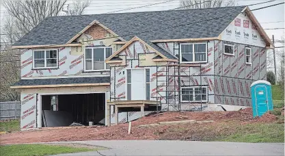  ?? BRIAN MCINNIS THE CANADIAN PRESS ?? A house is under constructi­on in an upscale subdivisio­n near Charlottet­own, P.E.I. Tourists visiting tidy, bucolic Prince Edward Island should keep their eyes open for some swagger this summer: The smallest province is on a tear.