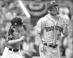  ?? AL DIAZ/TRIBUNE NEWS SERVICE ?? Houston Astros' Jose Altuve (27) runs out onto the field before the start of the MLB All-Star Game on July 11 at Marlins Park in Miami, Fla.