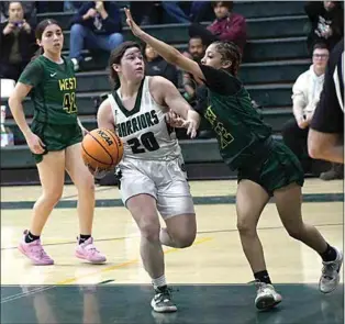  ?? PHOTO BY VICKY SHEA ?? Michelle Orellana looks to score a layup in league action against West. Orellana had 10 points to help Tehachapi to a 68-32 victory, clinching an undefeated league title (23-1; 8-0 SYML).
