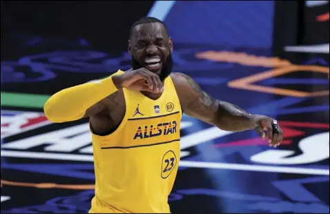  ?? Tribune News Service ?? Lebron James celebrates during Sunday’s NBA all-star game in atlanta. one year ago this week, the NBA was the first major sports to shut down due to the COVID-19 coronaviru­s.