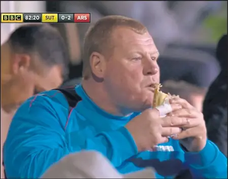  ??  ?? Sutton accepted reserve goalkeeper Wayne Shaw’s resignatio­n after he was pictures eating a pie during the BBC’s coverage