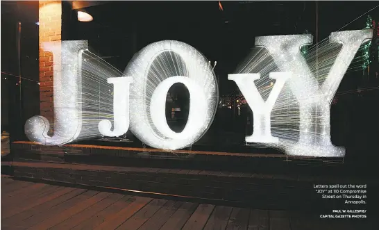  ?? PAULW. GILLESPIE/ CAPITAL GAZETTE PHOTOS ?? Letters spell out the word “JOY” at 110 Compromise Street on Thursday in
Annapolis.