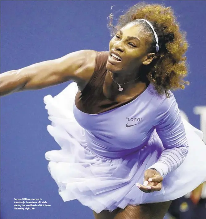  ??  ?? Serena Williams serves to Anastasija Sevastova of Latvia during the semifinals of U.S. Open Thursday night. AP