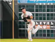  ?? Karen Warren/Houston Chronicle ?? Yankees shortstop Oswald Peraza throws out an Astros runner during Game 2 of last season’s American League Championsh­ip Series in Houston.